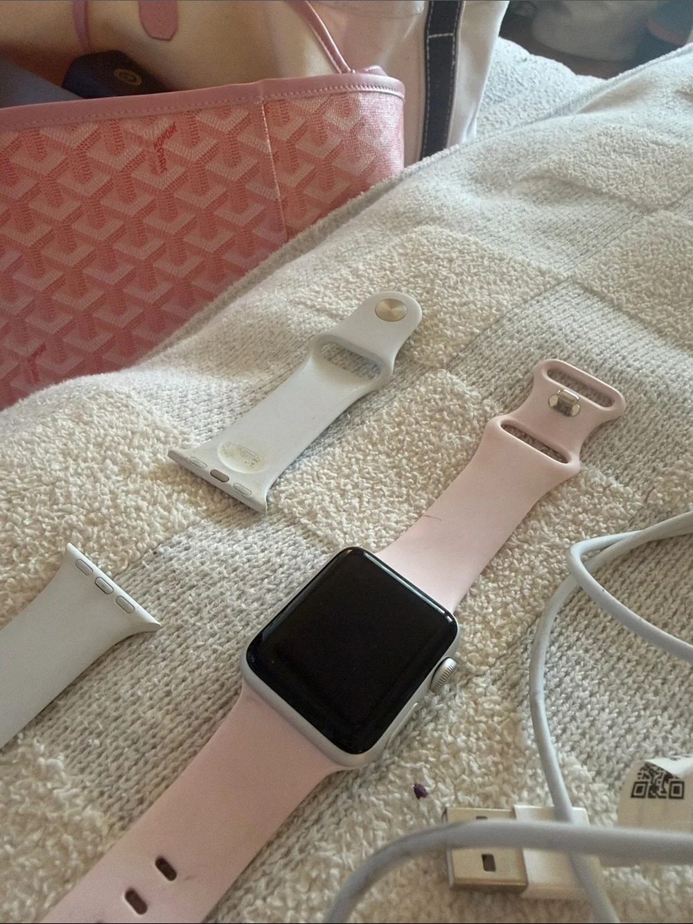 Apple Watch Series 3 complete with white and pink silicone bands and charger!